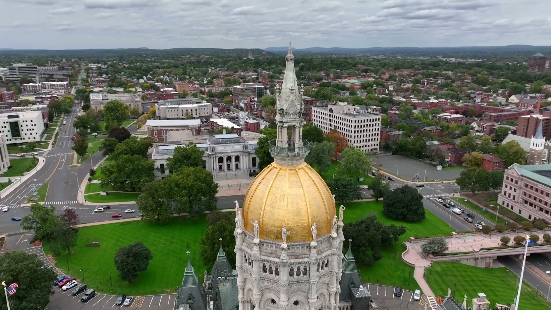 Aerial around the gilded dome of the Connecticut State Capitol